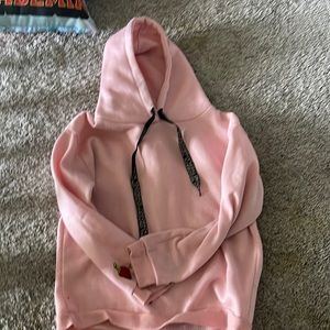Warm pink hoodie that is perfect for the winter